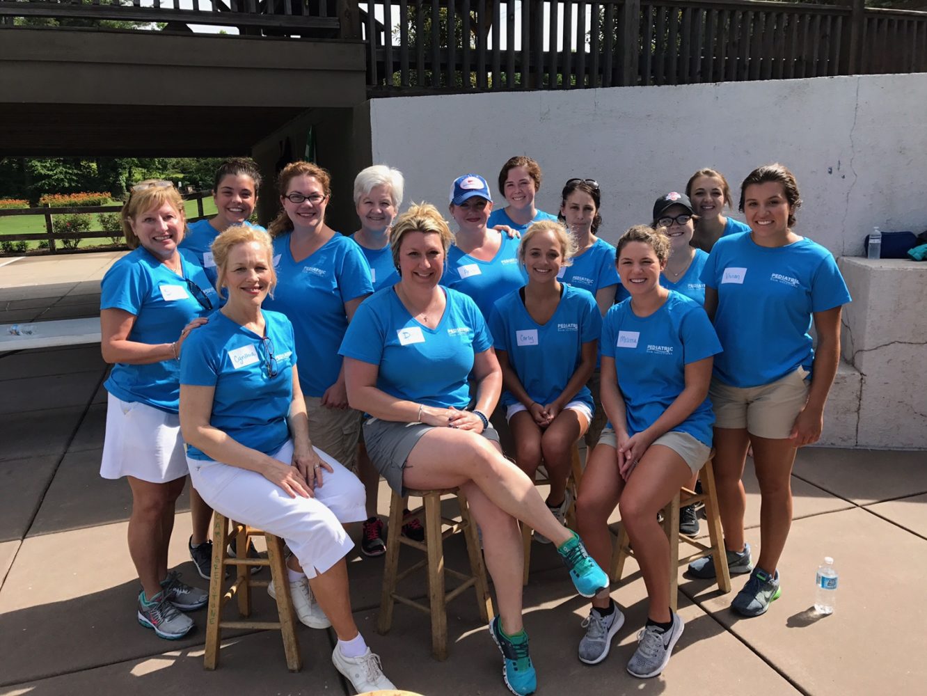 Team at summer camp checks campers for head lice.